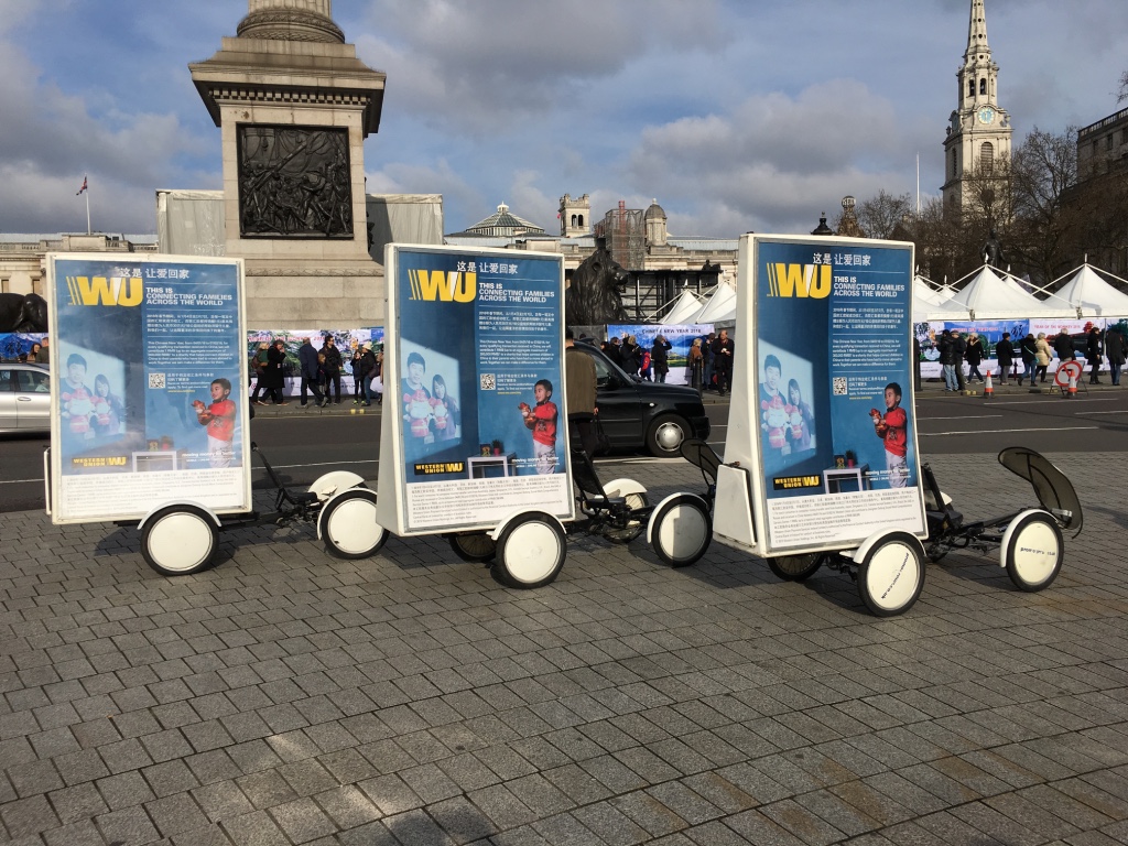 Three Western Union ad bikes lined up at Trafalgar Square